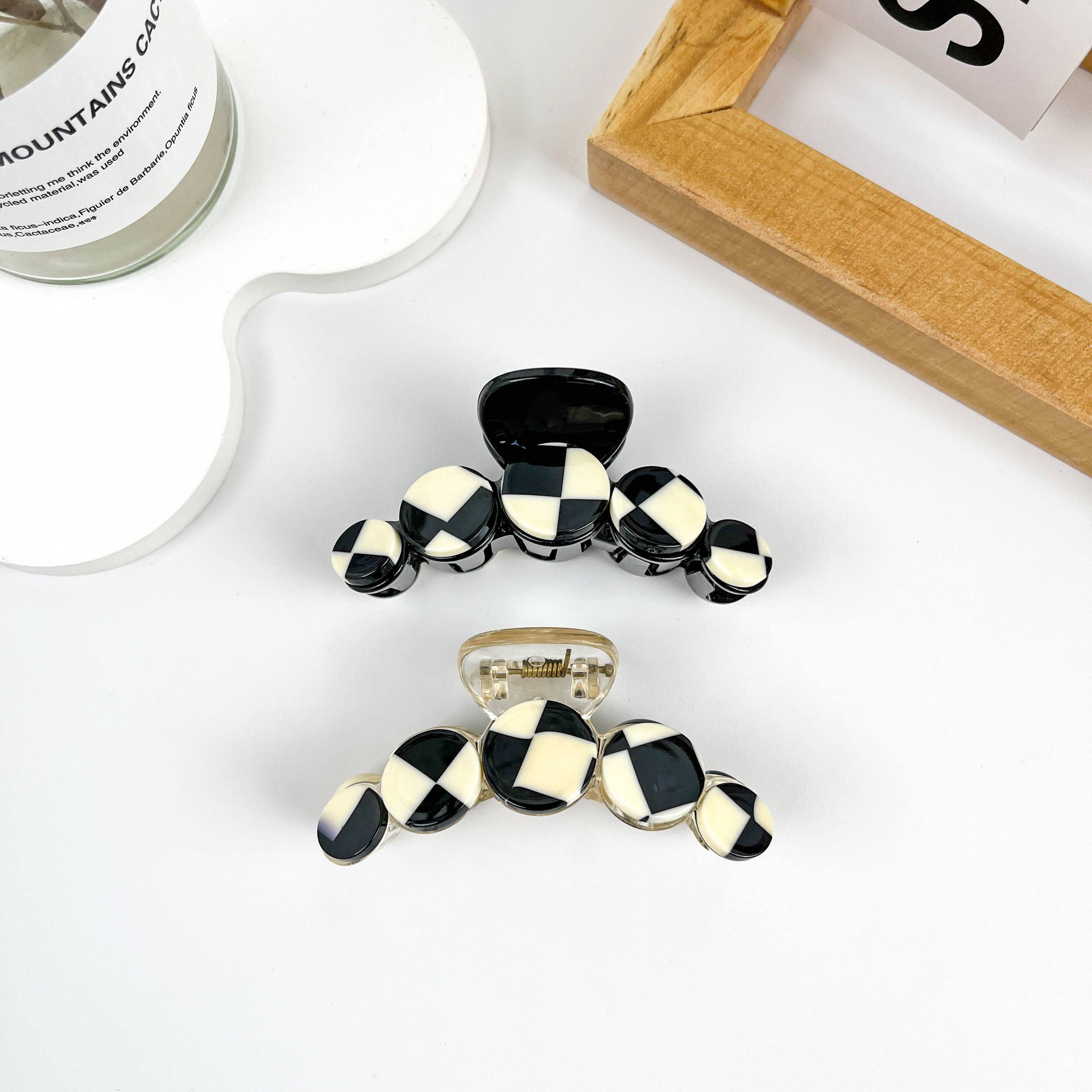 Simple black and white checkerboard hair clip