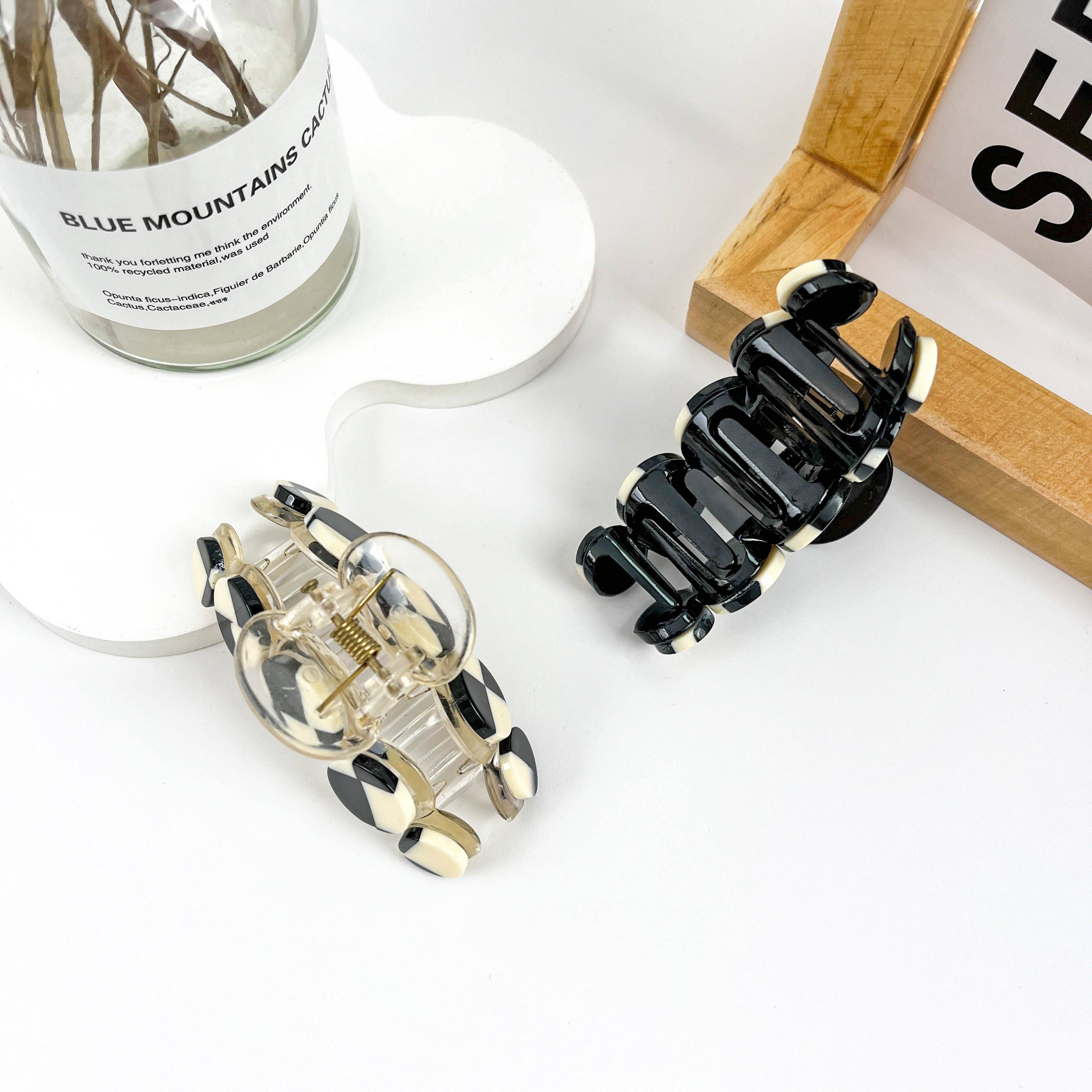 Simple black and white checkerboard hair clip