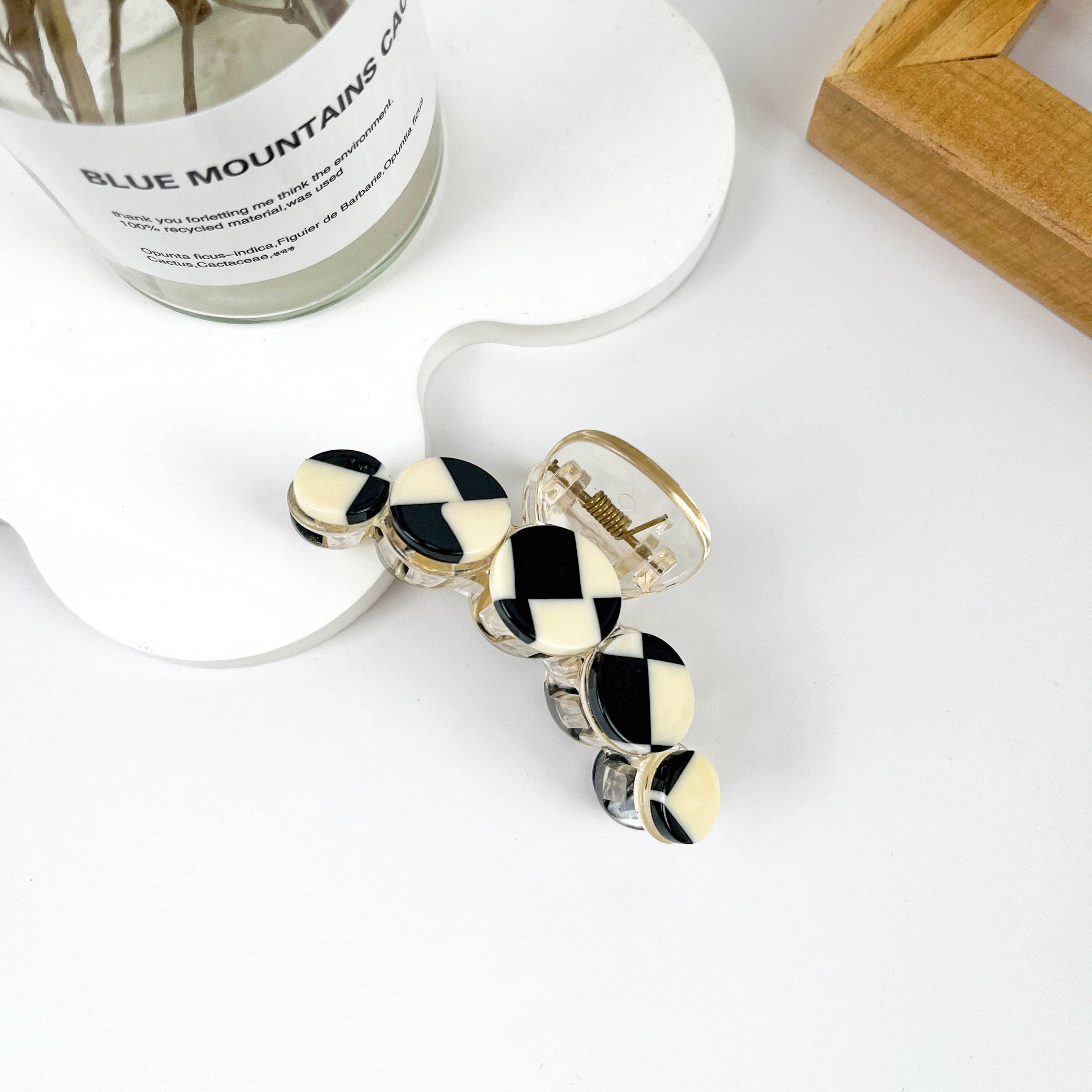 Simple black and white checkerboard hair clip